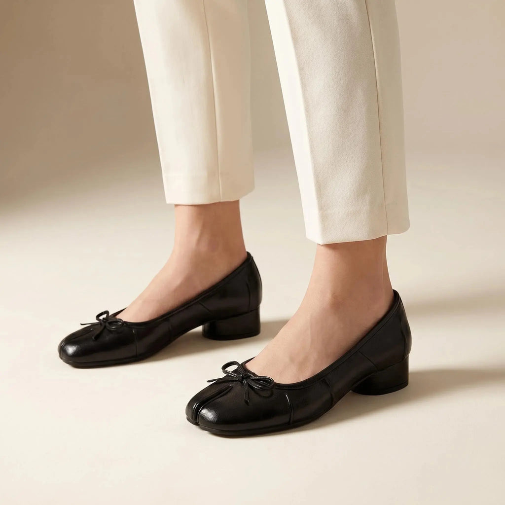 ZQW Bow Tabi Heel in white, worn on feet close-up – split-toe fit, bow embellishment, comfortable block heel, wide-foot friendly
