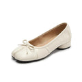 ZQW Bow Tabi Heel in white, 45-degree angle view – split toe with cute bow detail, low block heel, vegan leather slip-on heel