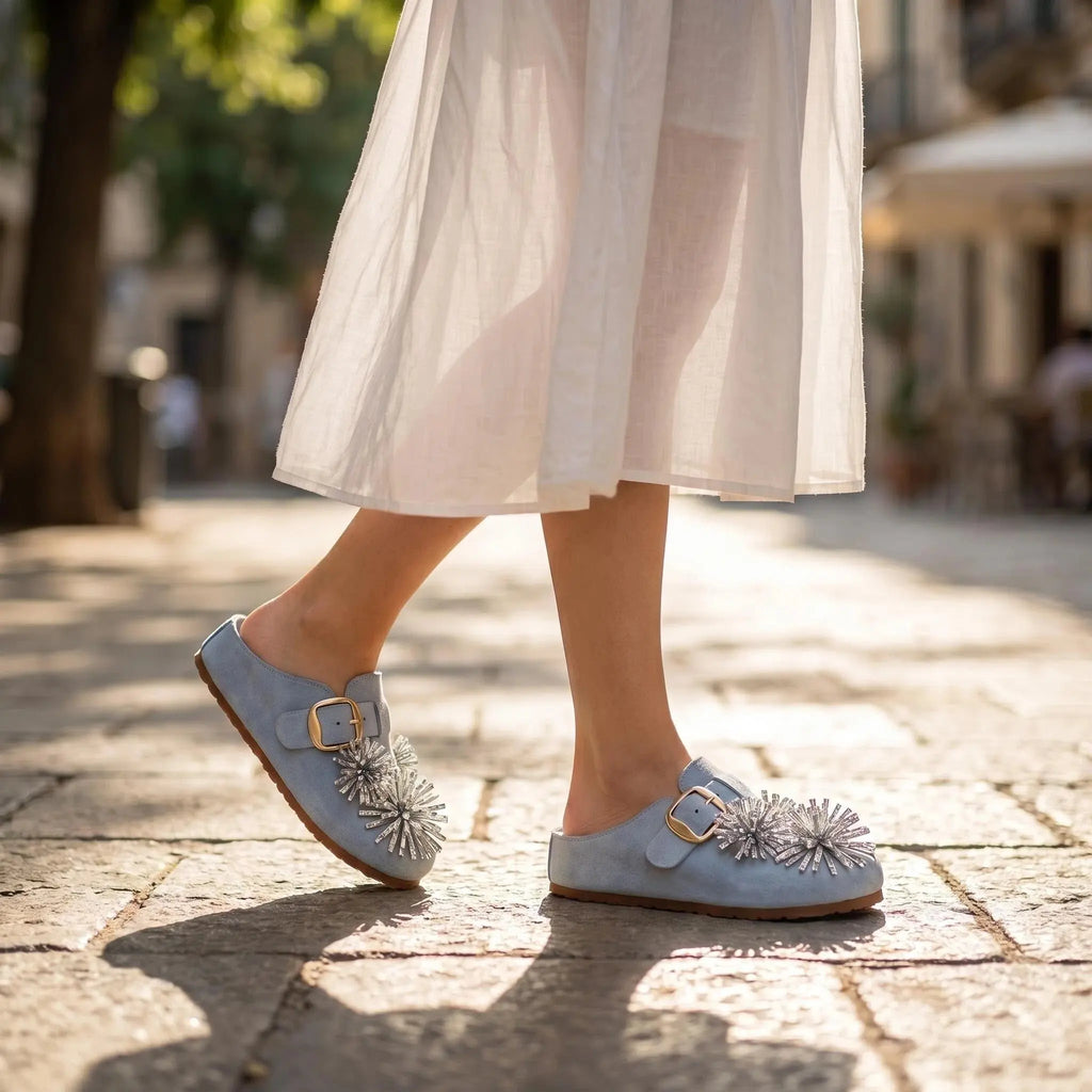 ZQW Crystal Flower Clogs in blue, worn on feet close-up – crystal flower detail, cushioned insole, chunky platform provides steady comfort, easy slip-on