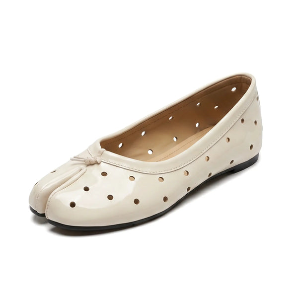 ZQW Cutout Polka Dot Tabi Flats in white, 45-degree angle view – split toe design with laser-cut polka dots, breathable vegan leather, slip-on flat