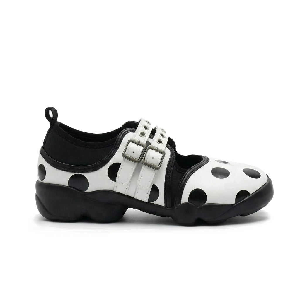 ZQW Dotty Split 1.0 white polka dot sneakers, side view – chunky dots on white base, Mary Jane style strap, cushioned sneaker sole, split-toe design