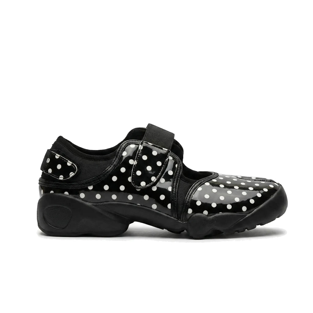 ZQW Dotty Split 2.0 black fine polka dot sneakers, side view – subtle small dots on black base, hook & loop adjustable strap, cushioned sneaker sole, split-toe design