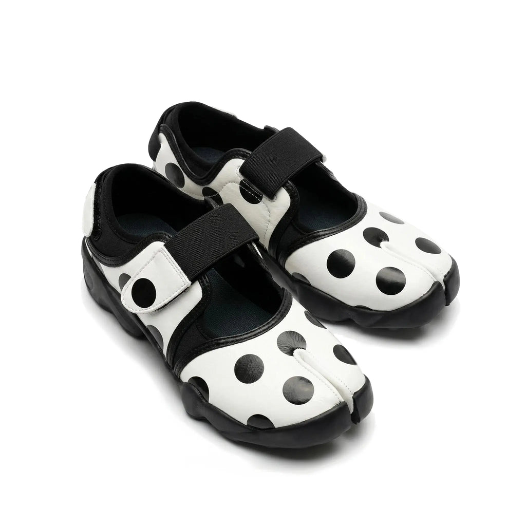 ZQW Dotty Split 2.0 Tabi Mary Jane Sneakers, pair 45-degree view – matching white bold polka dot pattern, hook & loop closure, classic Mary Jane tabi silhouette, perfect for casual playful looks