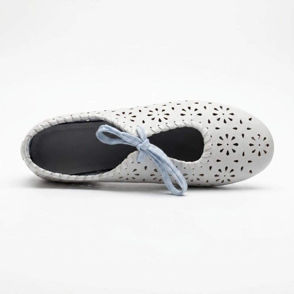 ZQW Lace-Up Cutout Floral Mary Janes in blue, top view – floral cutout detailing across upper, lace-up ribbon ties, round toe silhouette, cushioned insole