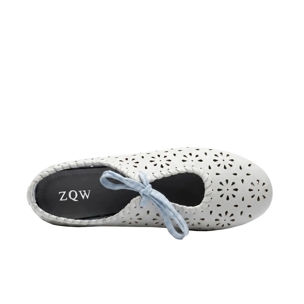 ZQW Lace-Up Cutout Floral Mary Janes in blue, top view – floral cutout detailing across upper, lace-up ribbon ties, round toe silhouette, cushioned insole