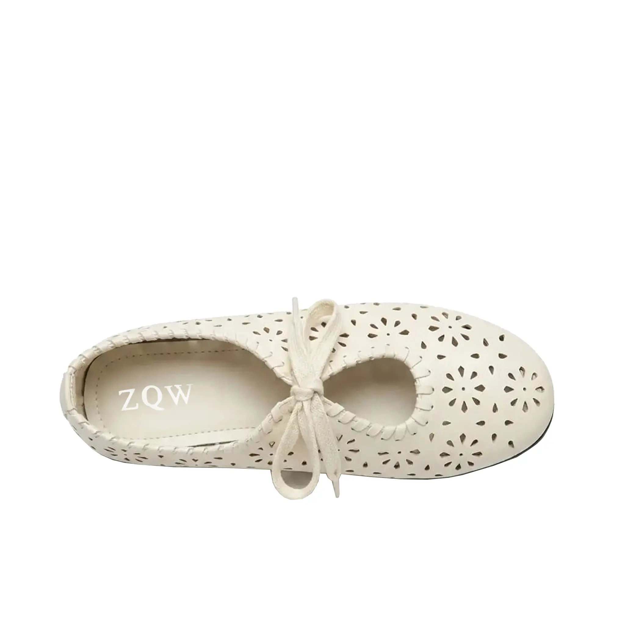 ZQW Lace-Up Cutout Floral Mary Janes in white, top view – floral cutout detailing across upper, lace-up ribbon ties, round toe silhouette, cushioned insole