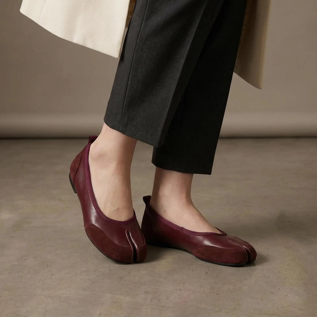 ZQW Mixed Media Tabi Flats in burgundy, worn on feet close-up – split-toe fit allows natural movement, mixed material texture, cushioned insole for all-day comfort