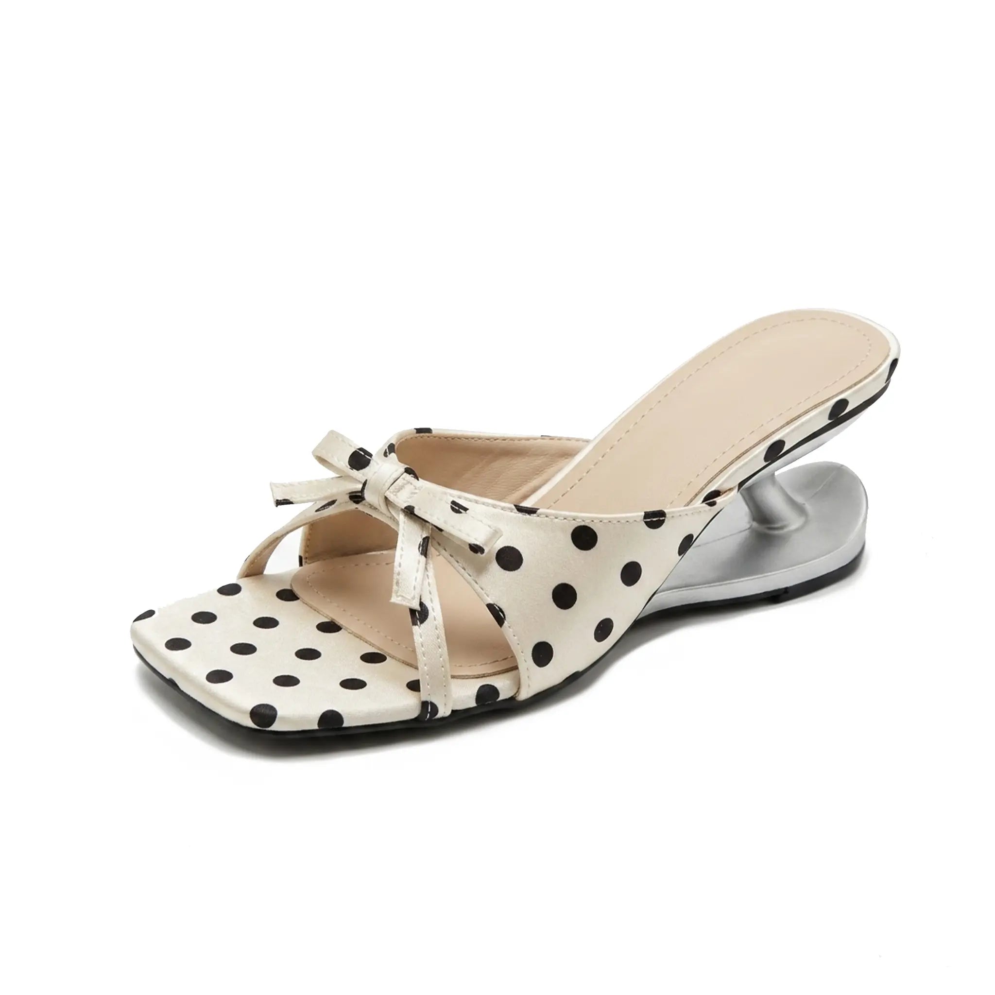 ZQW Polka Dot Sculptural Sandals, 45-degree angle view – polka dot satin upper, bow accent, open square toe, sculptural 6cm mid-block heel, slip-on mule style