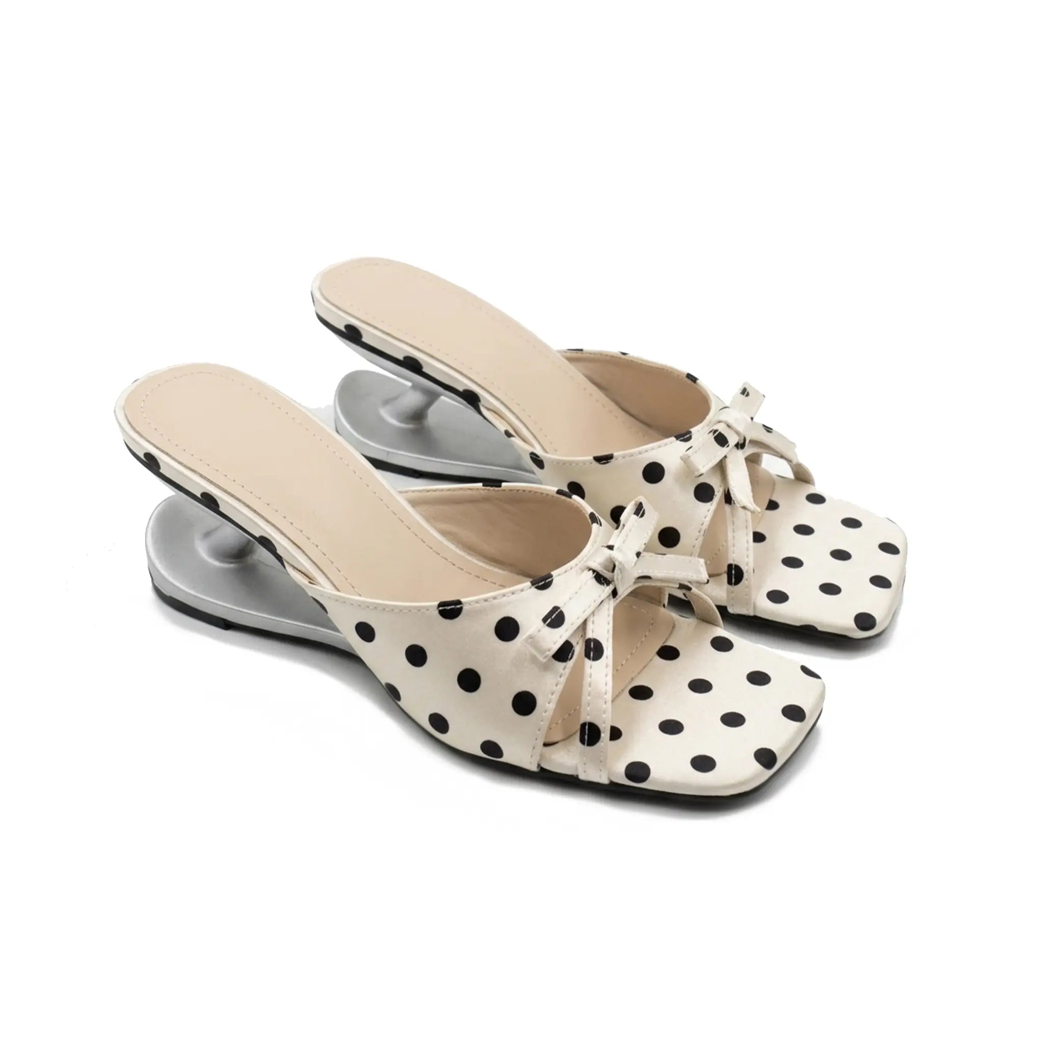 ZQW Polka Dot Sculptural Sandals, pair 45-degree view – matching polka dot satin mules with bow and sculptural heel, perfect for weddings or parties