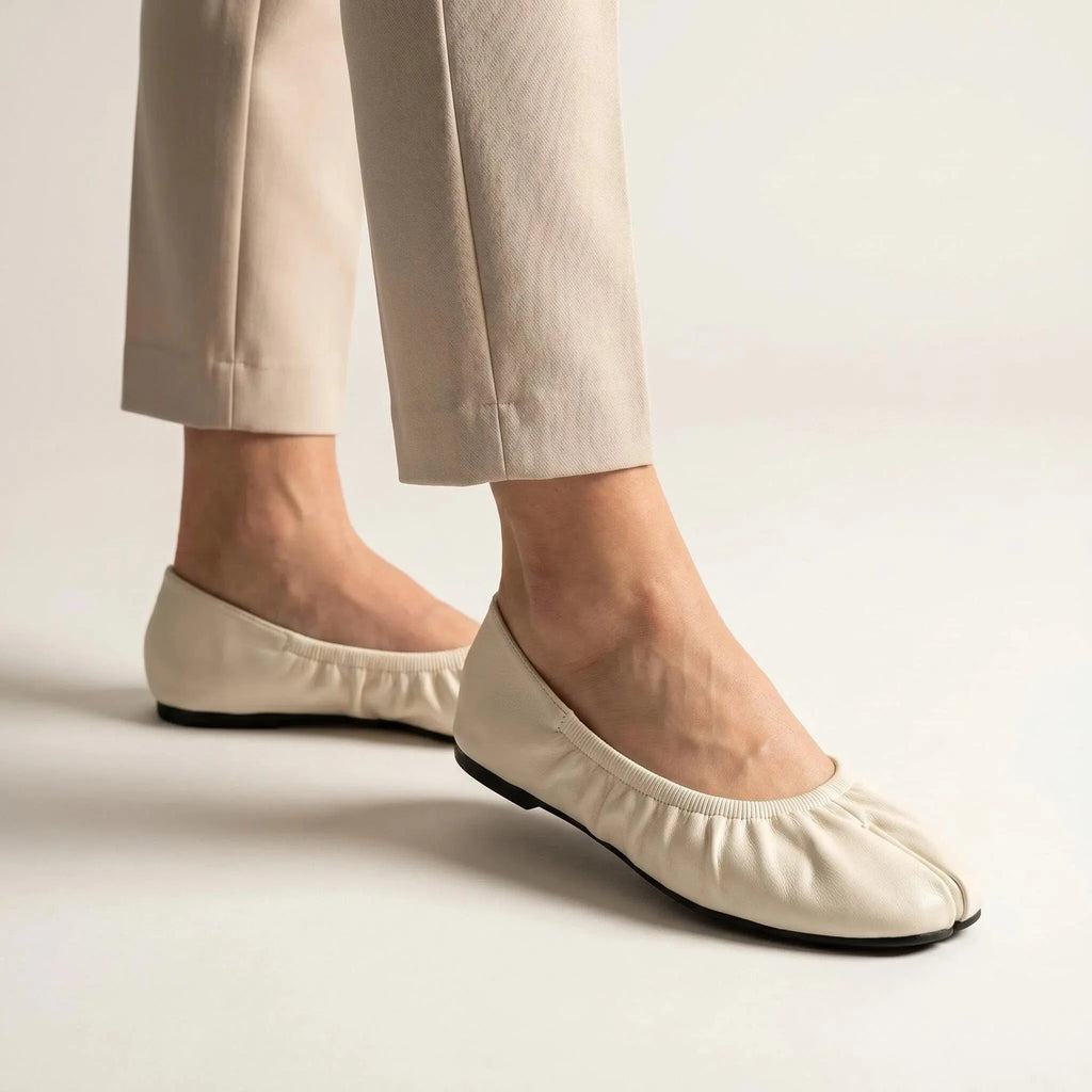 ZQW Ruched Tabi Ballet Flats in beige, worn on feet close-up – split-toe allows natural movement, ruched detail adds ballet charm, cushioned insole for all-day comfort