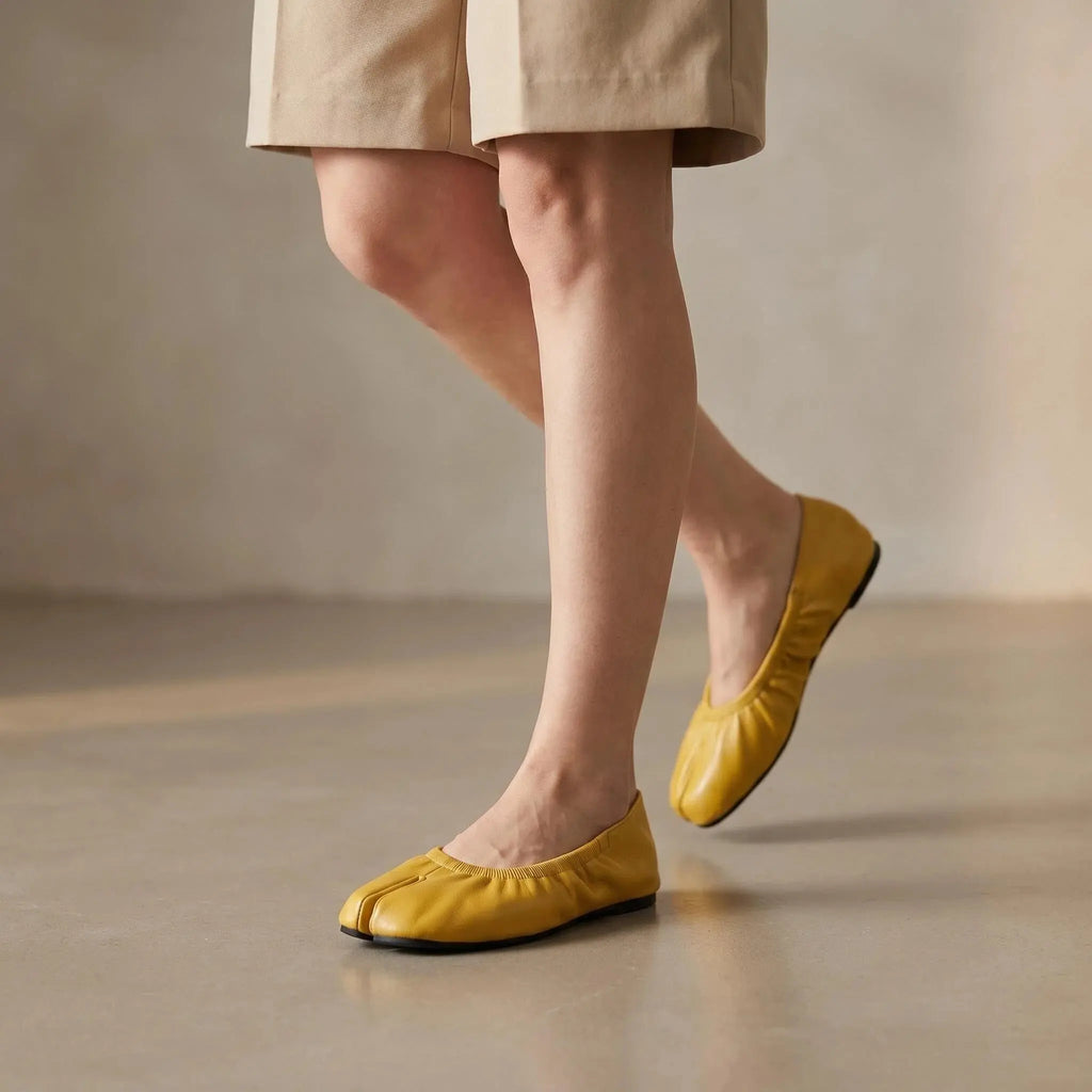 ZQW Ruched Tabi Ballet Flats in yellow, worn on feet close-up – split-toe allows natural movement, ruched detail adds ballet charm, cushioned insole for all-day comfort