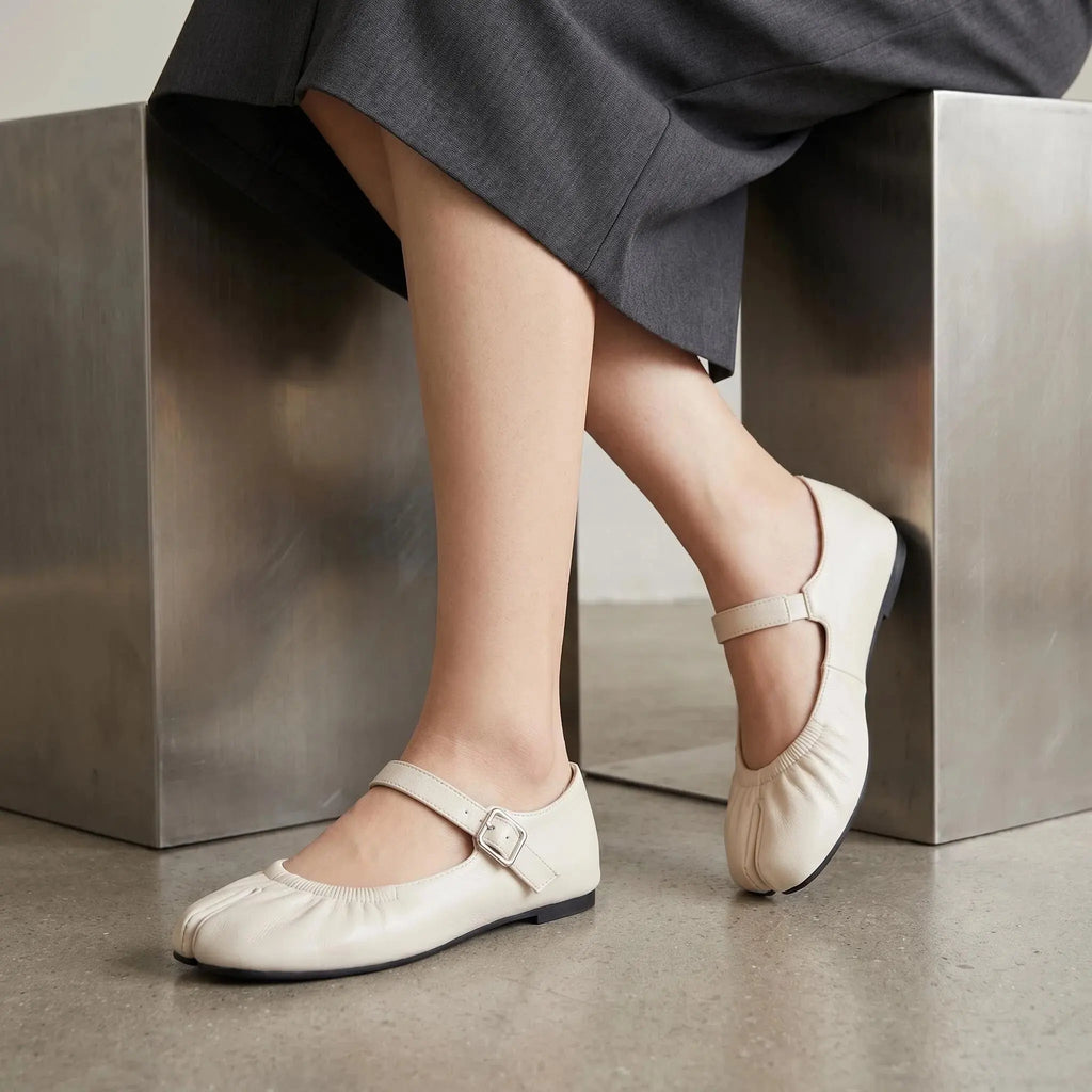 ZQW Ruched Tabi Mary Janes in white, worn on feet close-up – cross strap with elastic connector provides flexible fit, split toe allows natural movement, cushioned insole
