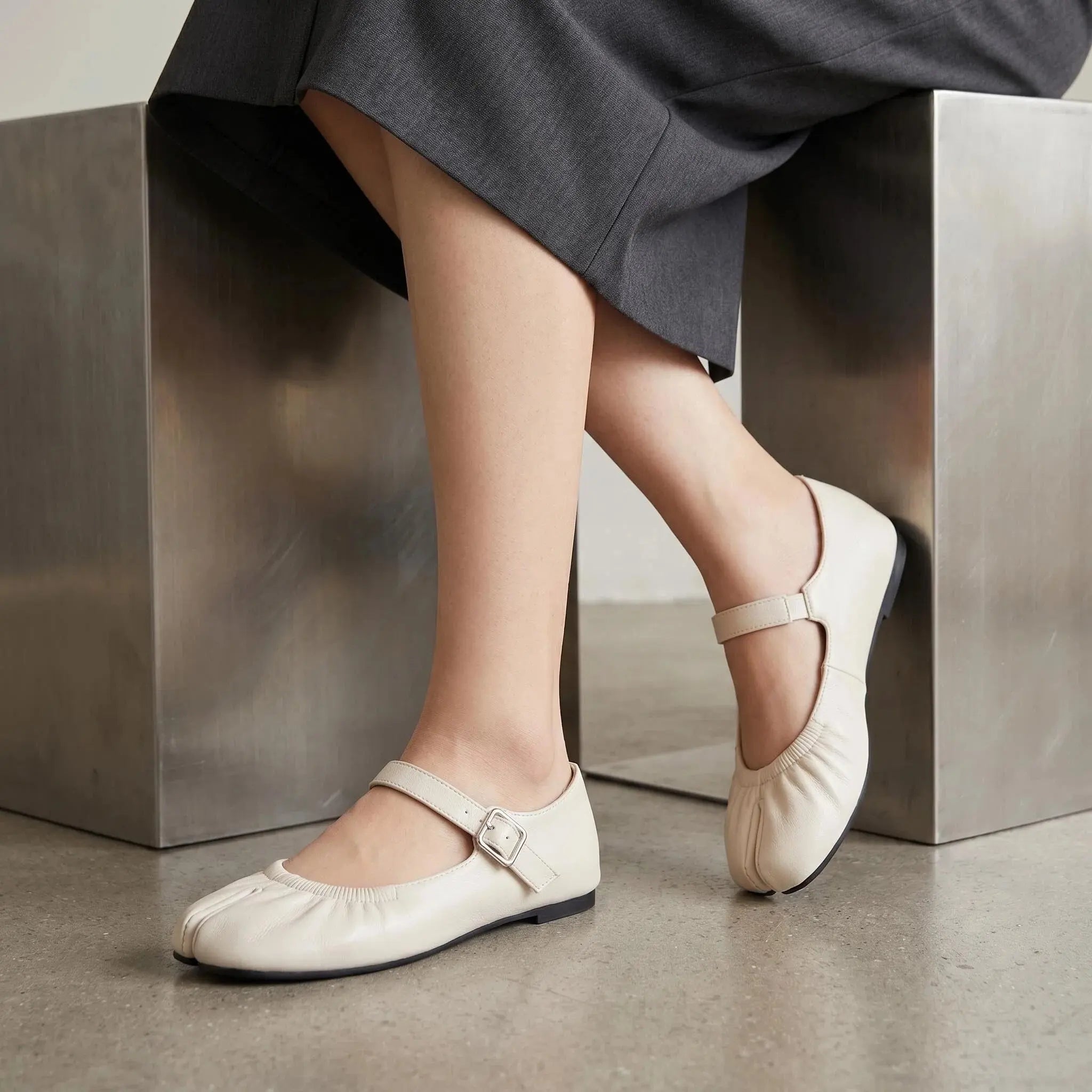 ZQW Ruched Tabi Mary Janes in white, worn on feet close-up – cross strap with elastic connector provides flexible fit, split toe allows natural movement, cushioned insole