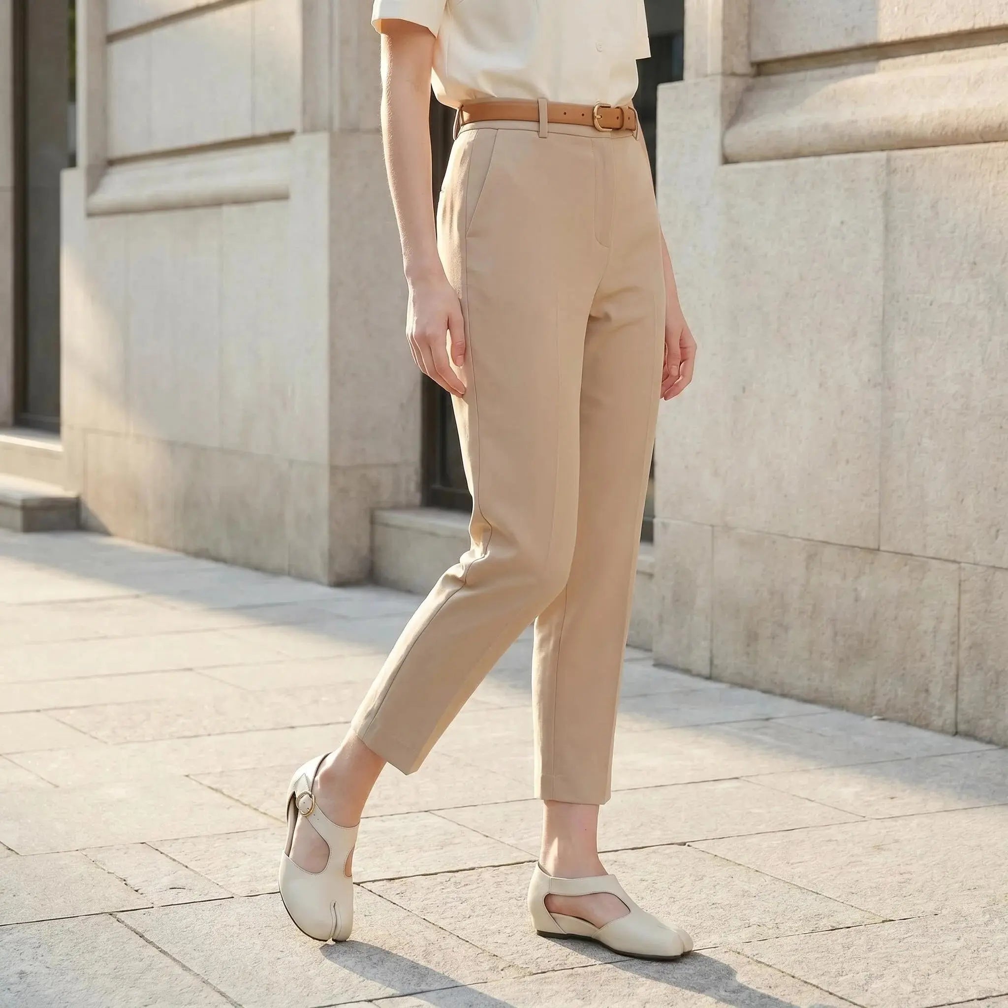 ZQW Tabi Mary Jane Flats in white, worn on feet close-up – T-strap secured with buckle, side cutouts allow airflow, split-toe freedom, all-day comfort